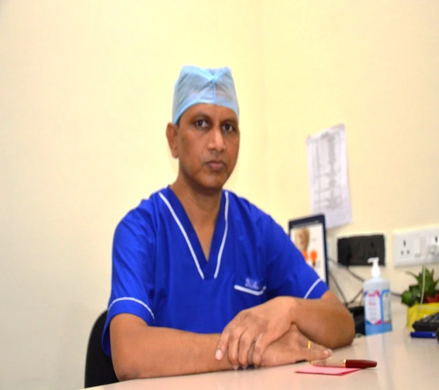 DR. ANURANJAN KUJUR